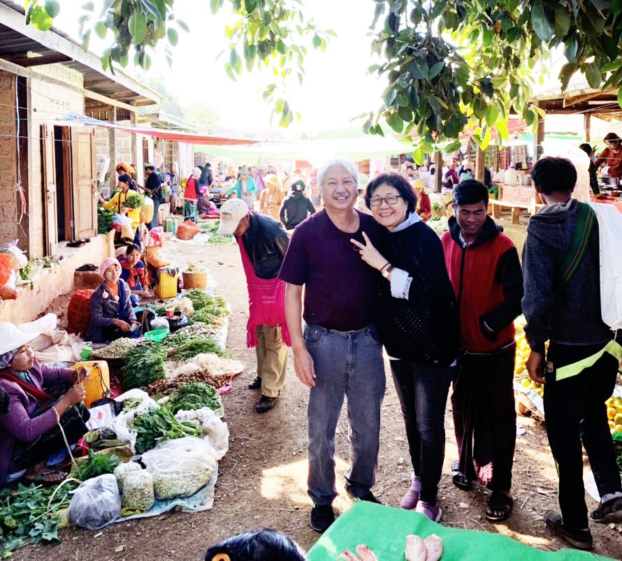 Dr. Su and wife Ray at a bazaar