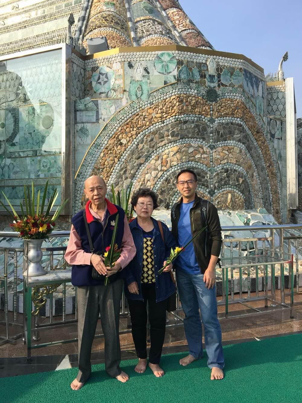 Chin Fee Har with her husband and son