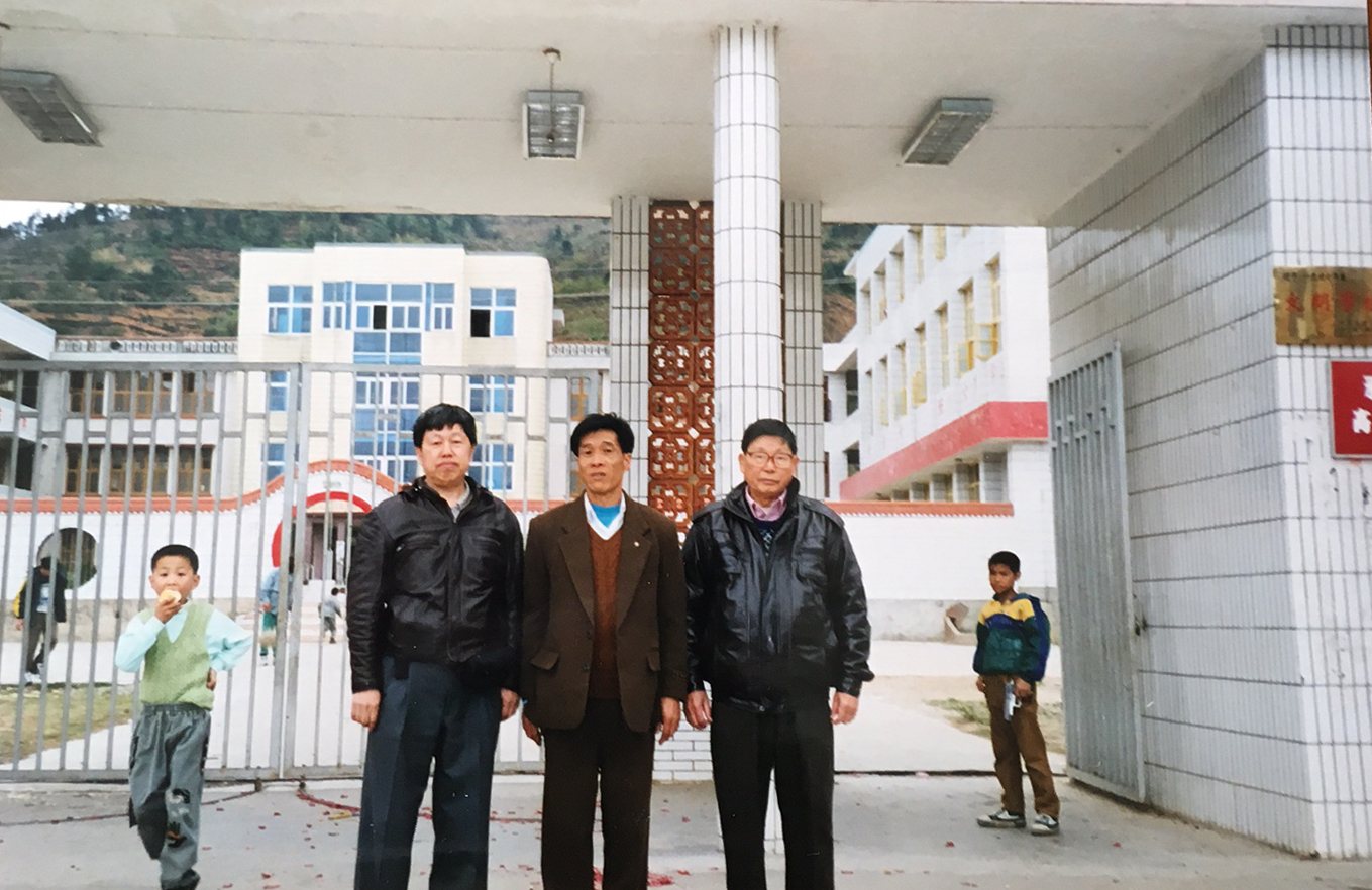 Steven Kong and friends visiting the school in 1999