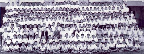 Administrators, teachers, and boy students in the 1950s