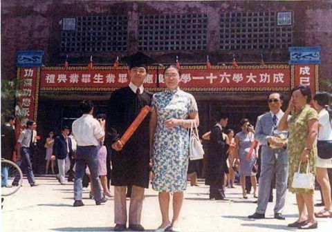 Teacher Regina with son Noel at graduation