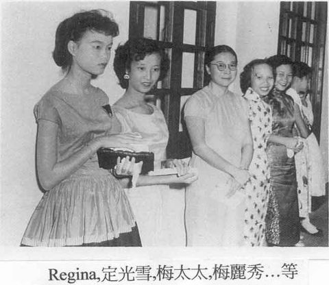 Regina with other teachers and their daughters