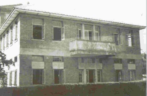 Wanhua school building overlooking Mission Road which runs parallel with railroad tracks
