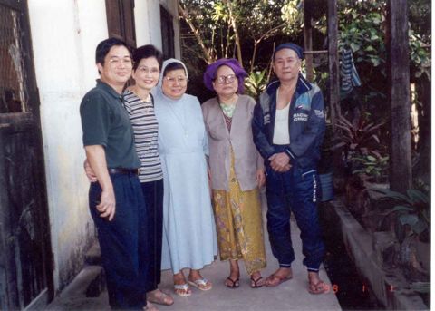 Noel and Agatha visiting with Mother and friends at St. Theresa's Church