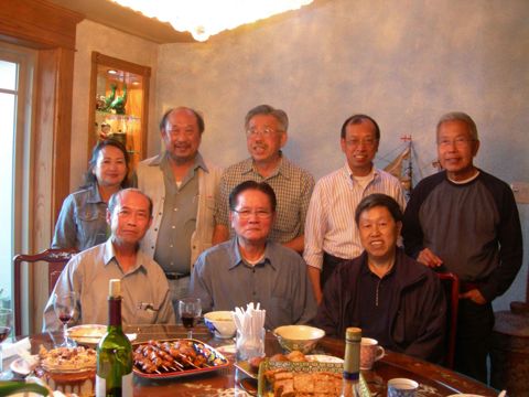 Stephen Chu seated between Henry Lim and Steven Leesan Kong